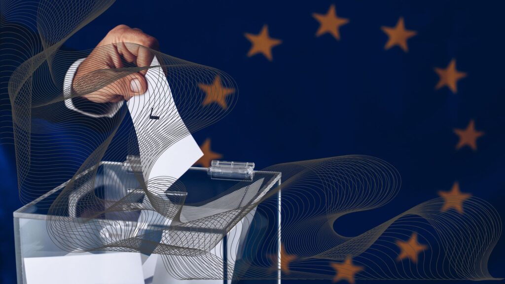 Wybory do Parlamentu Europejskiego. Mężczyzna wrzuca głos do urny